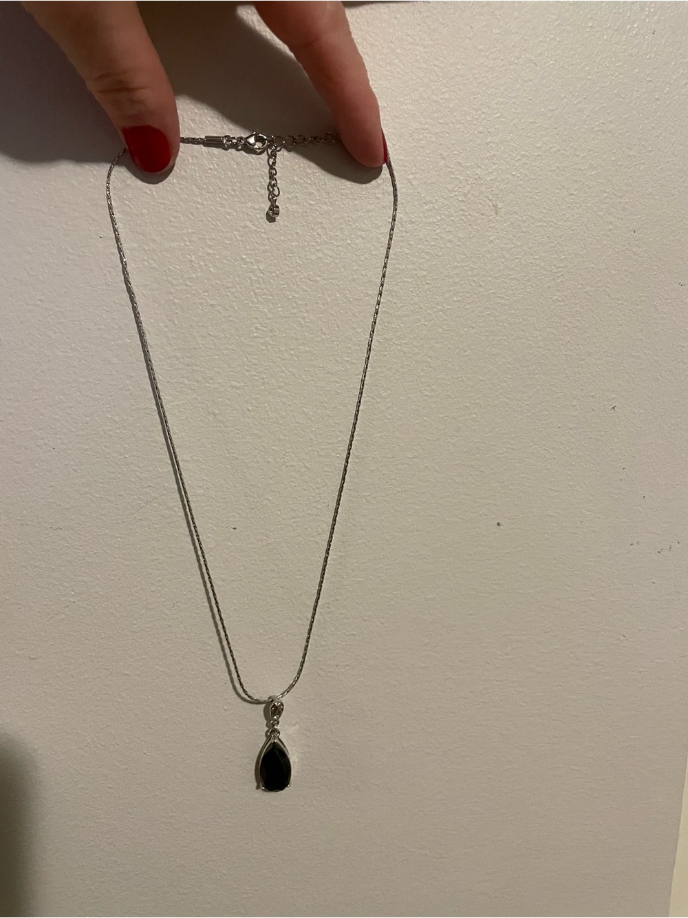 Elegant Silver Necklace with Black Teardrop Pendant